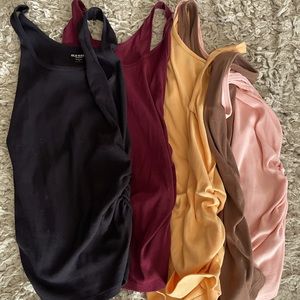 Maternity tank tops with rubbed sides for growing belly